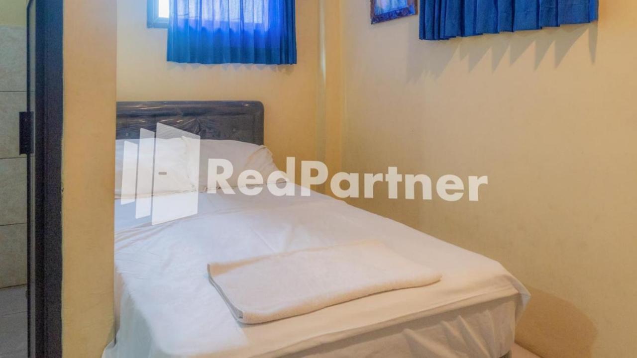 Vandhela Homestay Syariah Mitra Reddoorz Surabaya Esterno foto